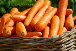 Basket containing fresh carrots